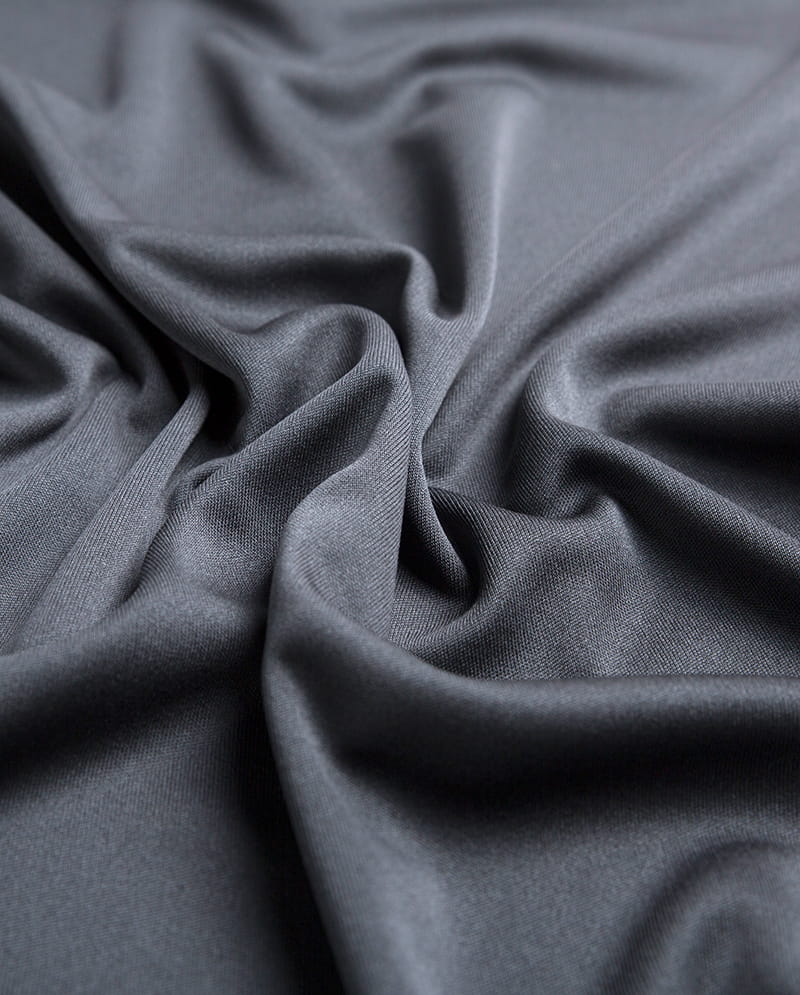 Độ co giãn và đàn hồi của vải dệt kim: Tại sao chúng phù hợp với ứng dụng trang phục thể thao, trang phục năng động?